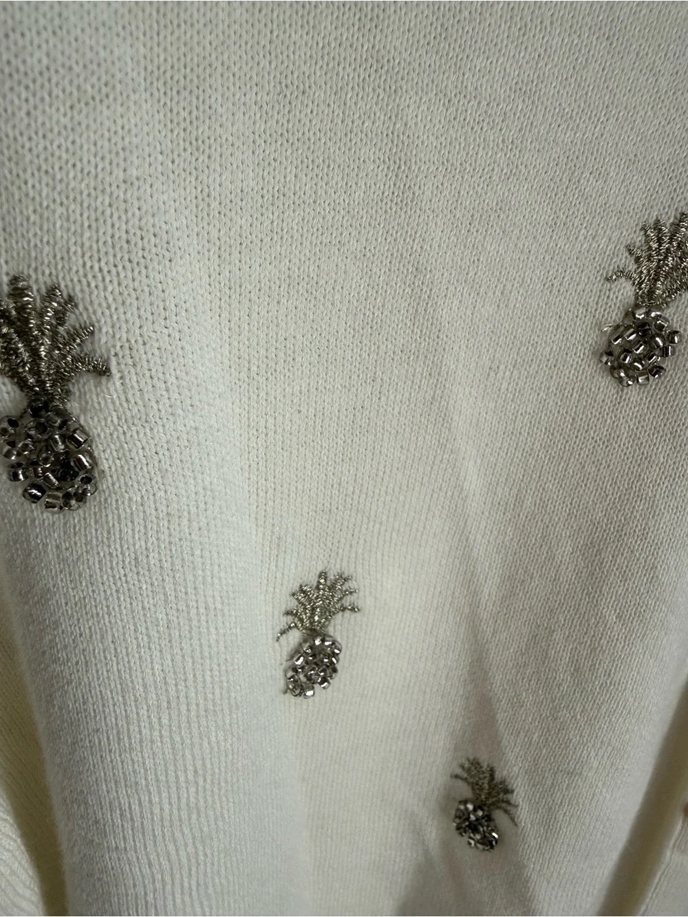 Tommy Bahama Cream Button-Front Pima Cotton Top with pineapple embellishments.